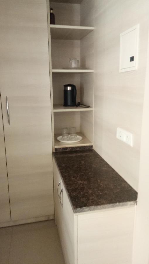 Omaxe Krishna Aavas Apartman Vrindávan Szoba fotó